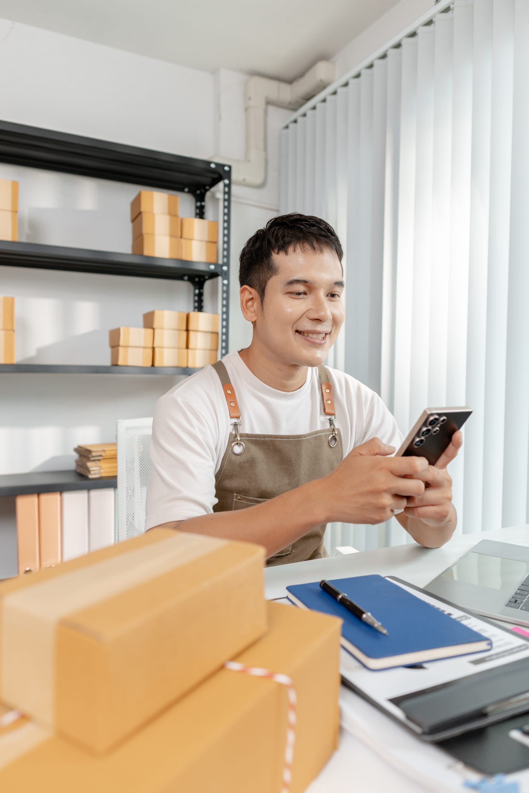 young man using phone in workplace setting 2026 01 11 10 14 52 utc scaled